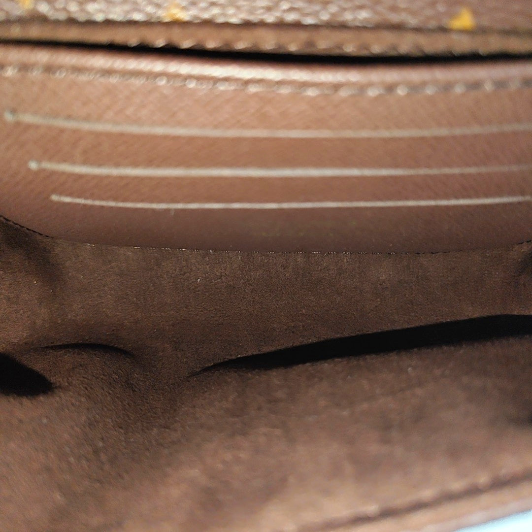 MADELEINE Monogram Coated Canvas Brown
