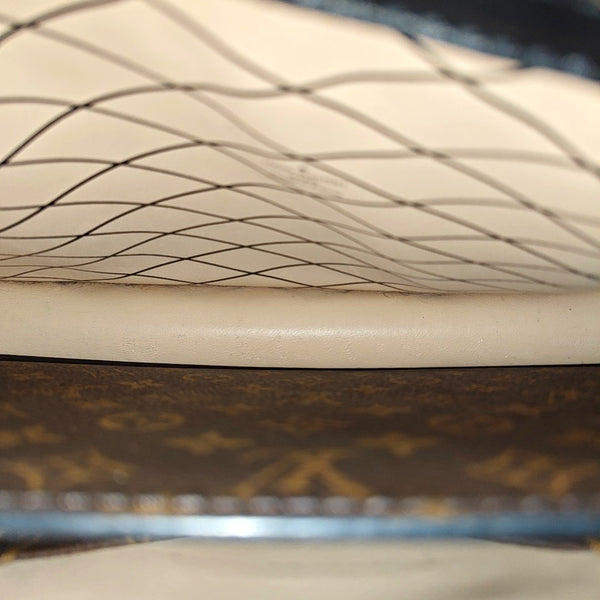 TRUNK Monogram Coated Canvas Brown