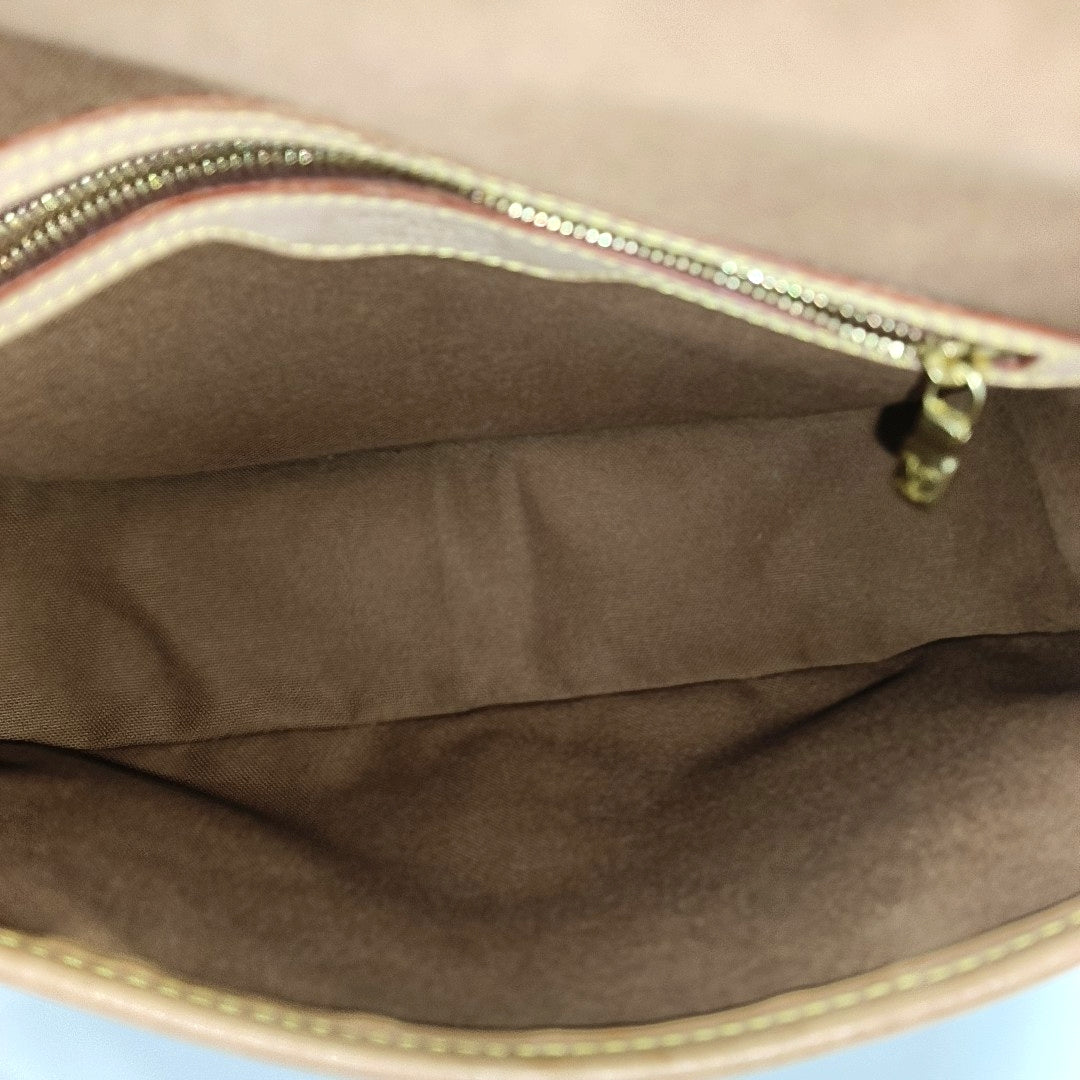 SOLOGNE PM Monogram Coated Canvas Brown