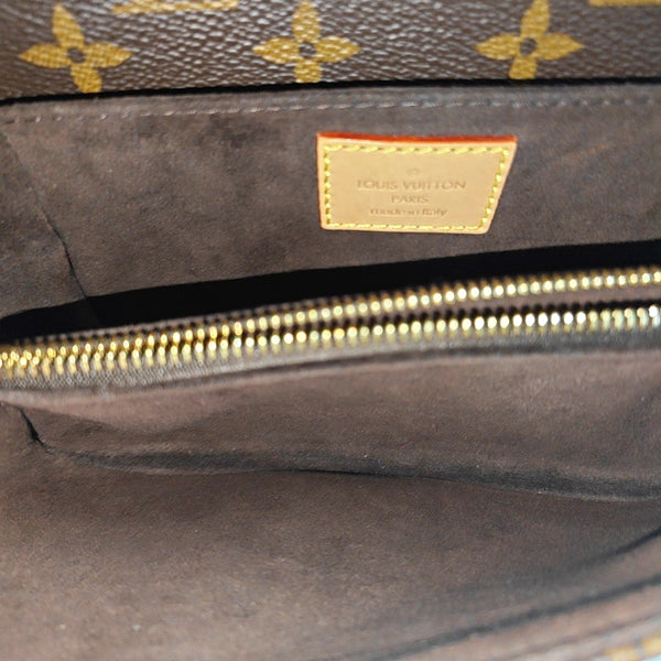 MÉTIS EAST WEST Monogram Coated Canvas Brown
