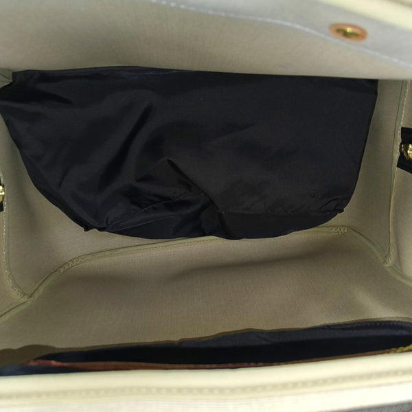 EVASION Monogram Coated Canvas Brown