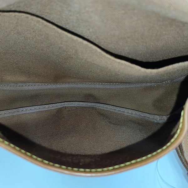 SAUMUR 30 Monogram Coated Canvas Brown