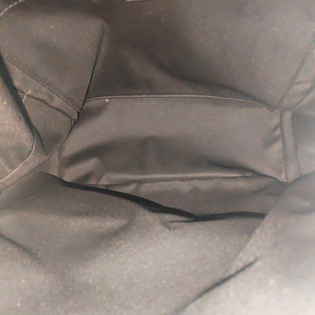 Monogram Coated Canvas Backpack Brown