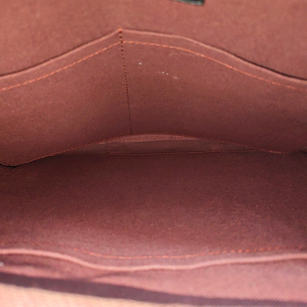 PORTE-DOCUMENTS PM Monogram Coated Canvas Brown