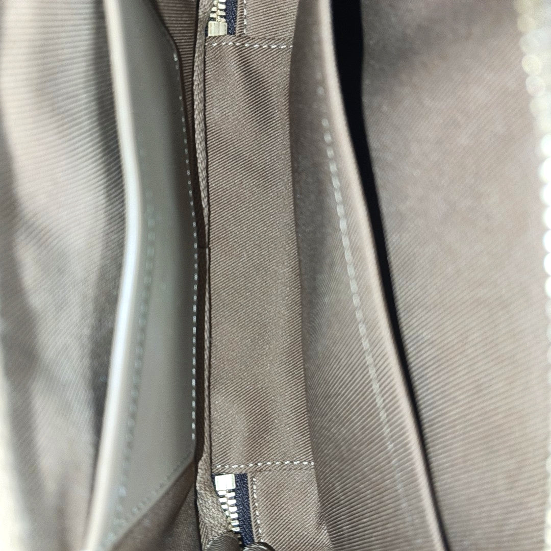 UTILITY Monogram Coated Canvas Brown
