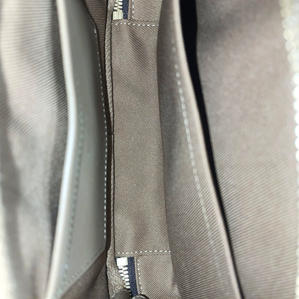 UTILITY Monogram Coated Canvas Brown