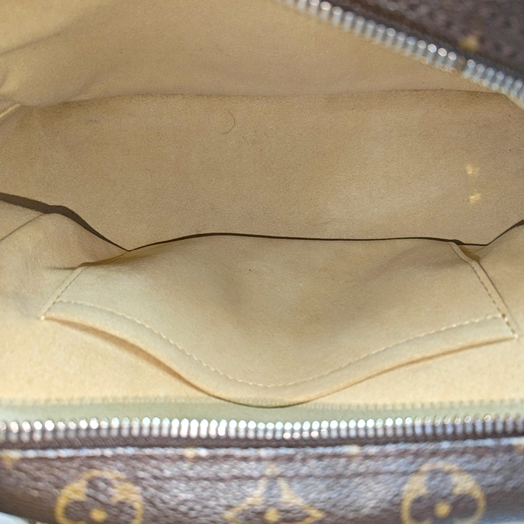 MANHATTAN PM Monogram Coated Canvas Brown