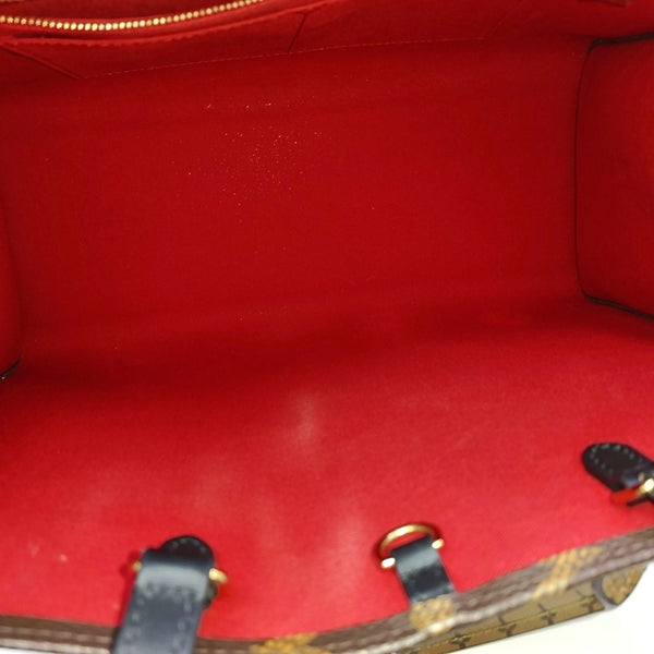 ONTHEGO MM Monogram Coated Canvas Brown