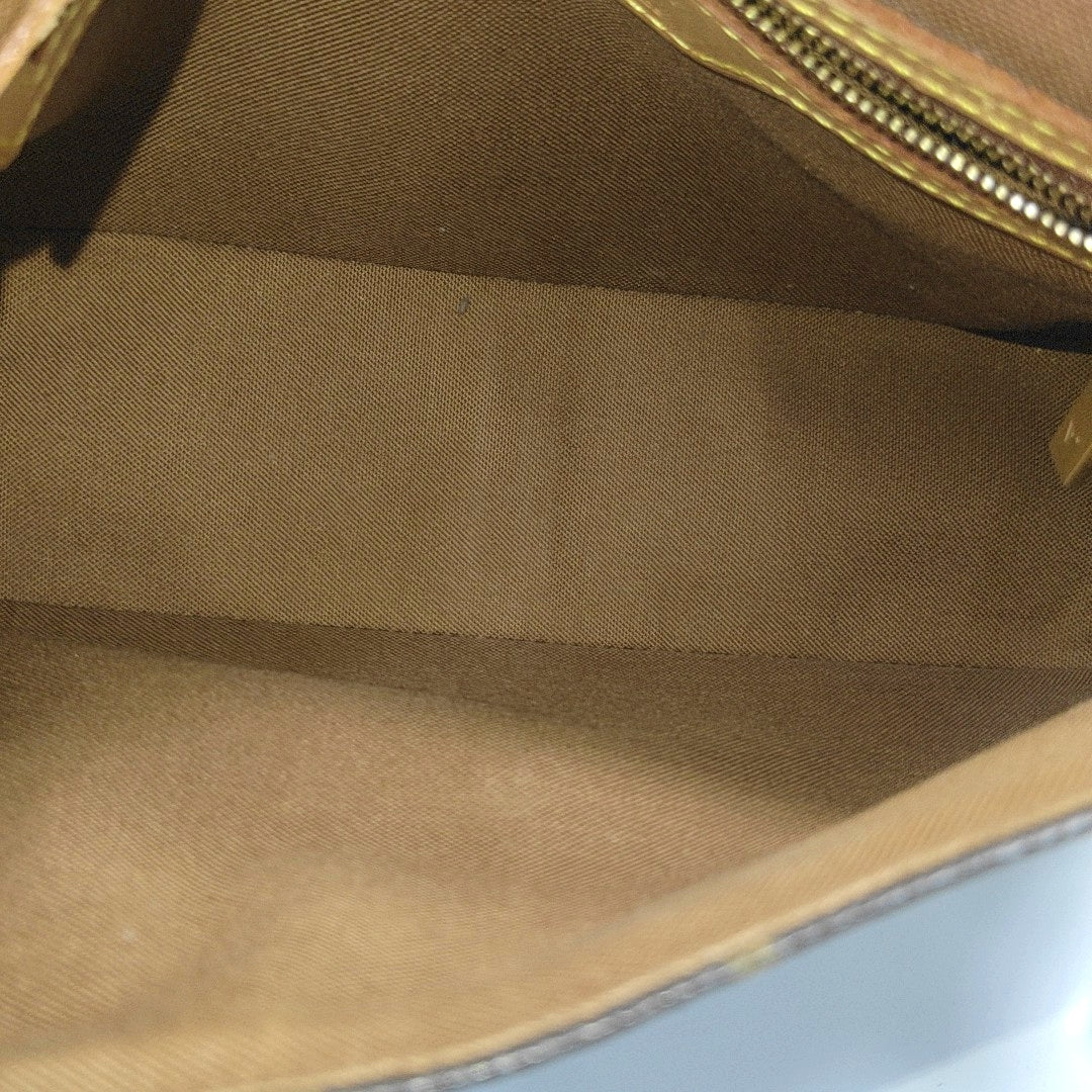 LOOPING PM Monogram Coated Canvas Brown