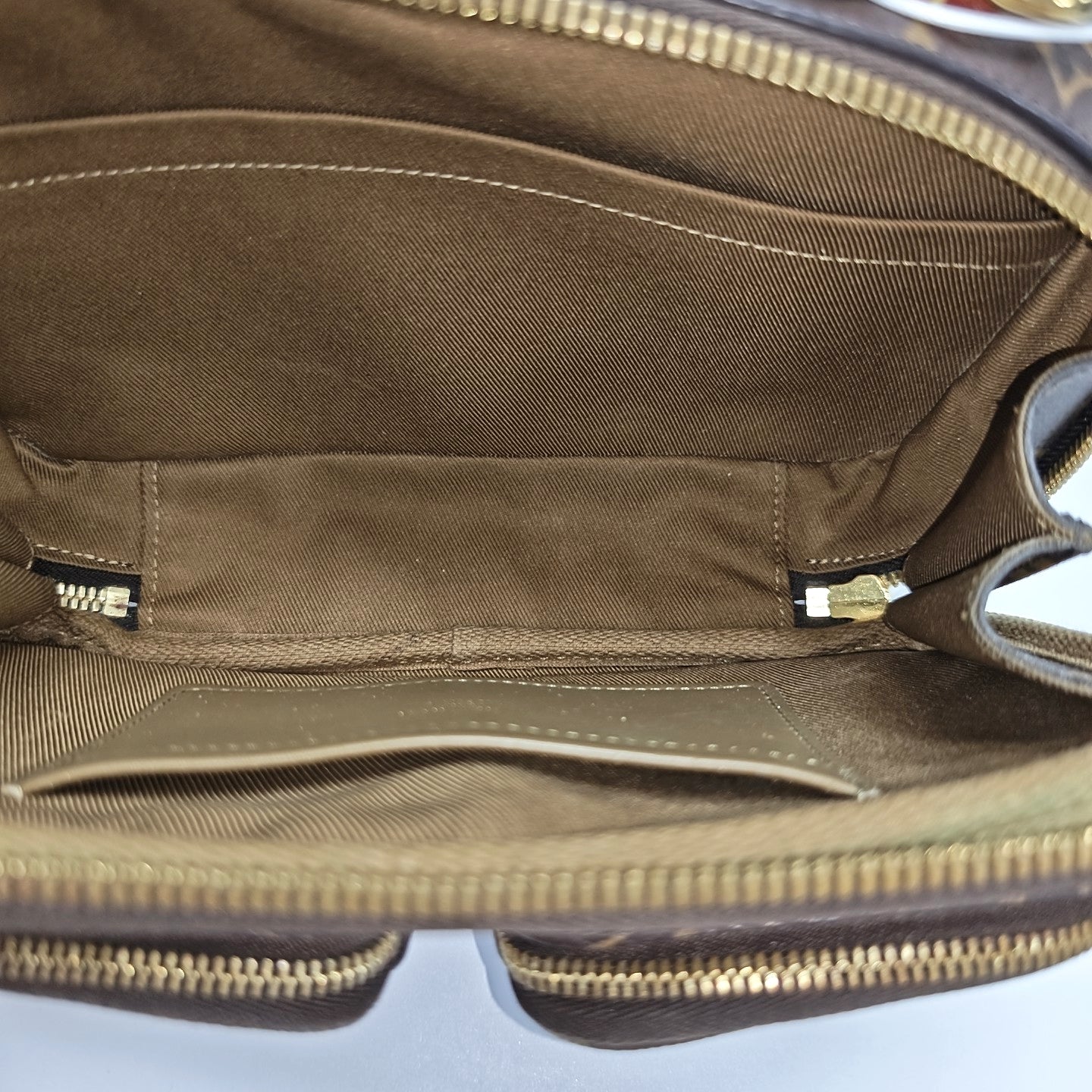 UTILITY Monogram Coated Canvas Brown