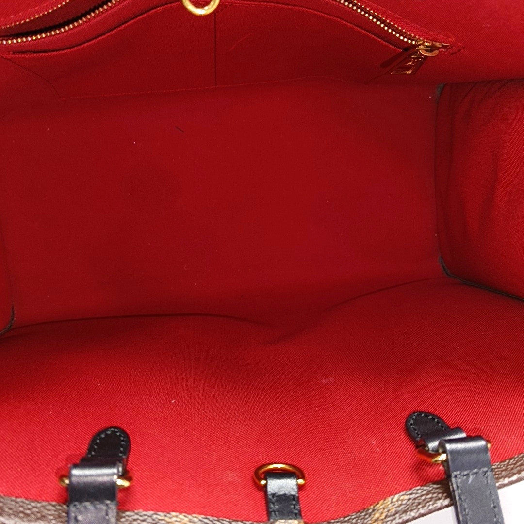 ONTHEGO MM Monogram Coated Canvas Brown