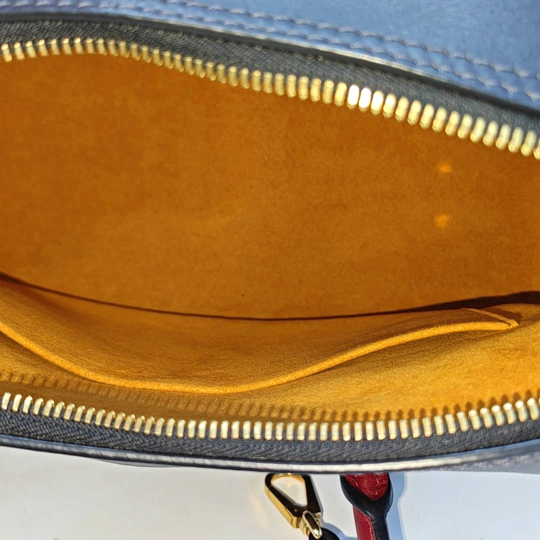 TUILERIES Monogram Coated Canvas Brown