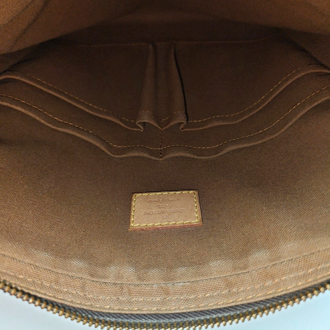 TROTTEUR Monogram Coated Canvas Brown