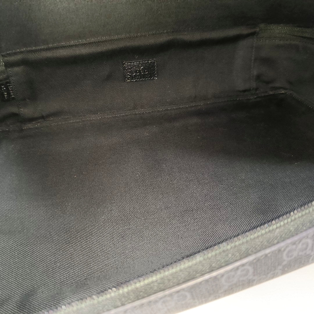 Monogram Coated Canvas Clutch Black