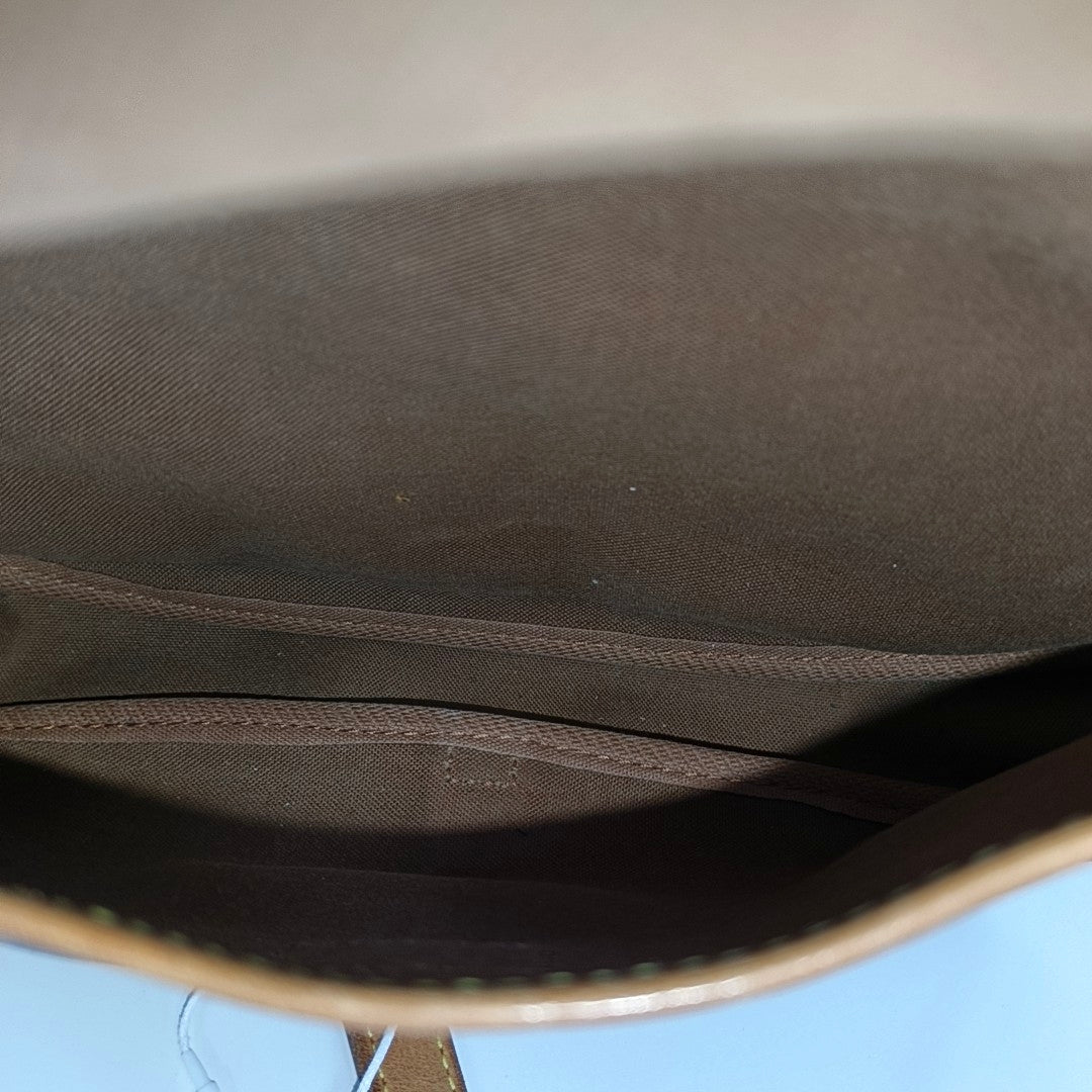 SAUMUR Monogram Coated Canvas Brown