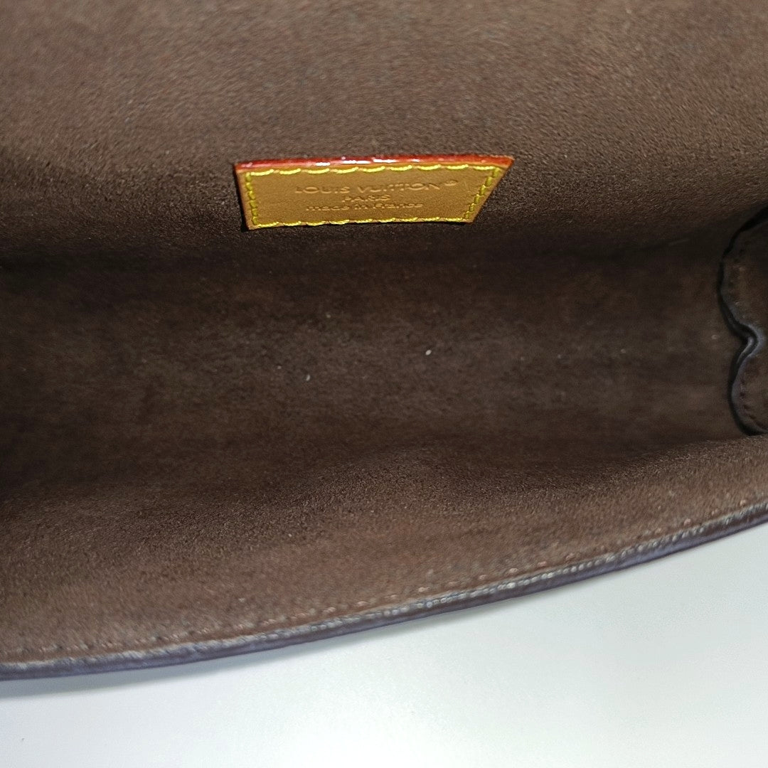 Pochette Camille Monogram Coated Canvas Brown
