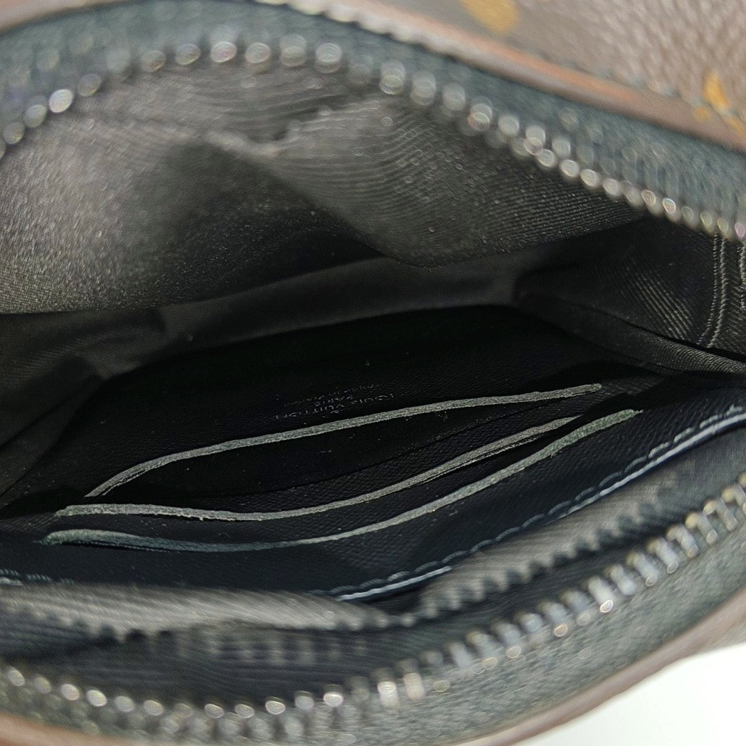 CHRISTOPHER Monogram Coated Canvas Brown