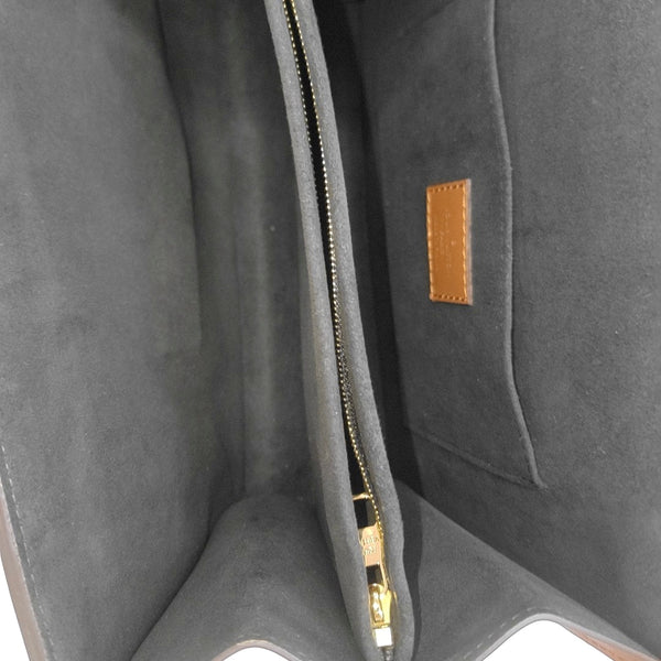 DAUPHINE MM Monogram Coated Canvas Brown