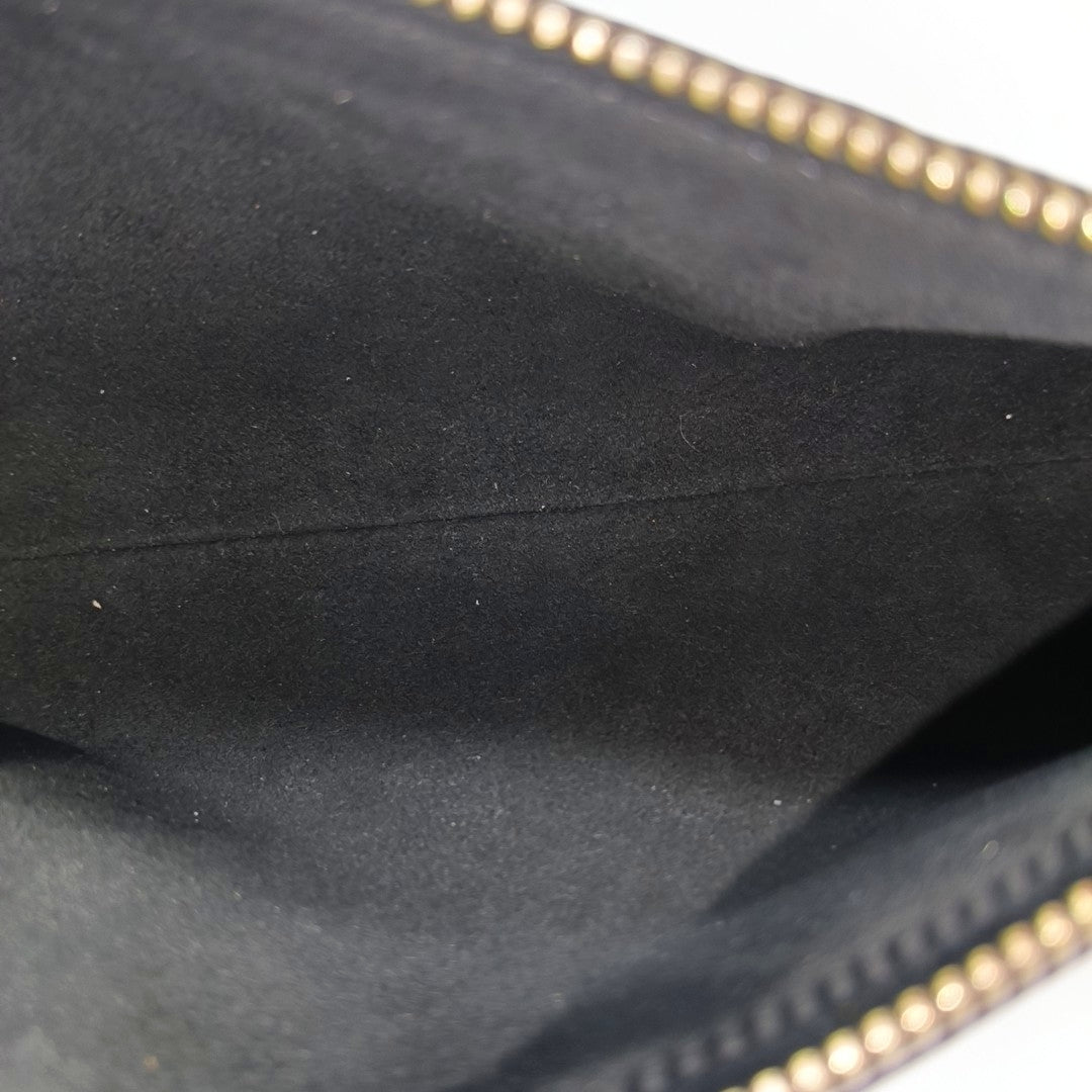 SLIM TRUNK Monogram Coated Canvas Brown