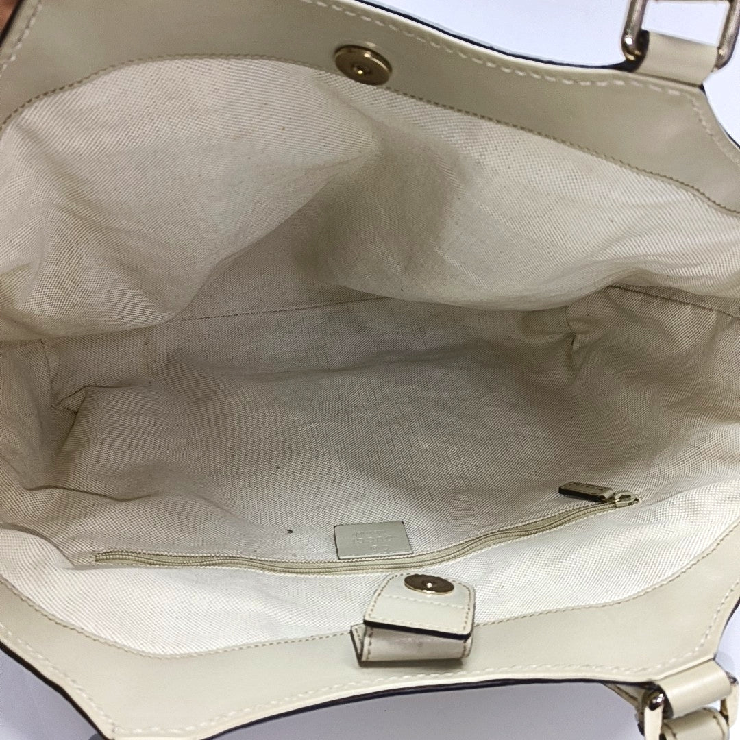 Authenticated pre-owned  Sukey Monogram Canvas Beige - Top Handle Bag at Looply