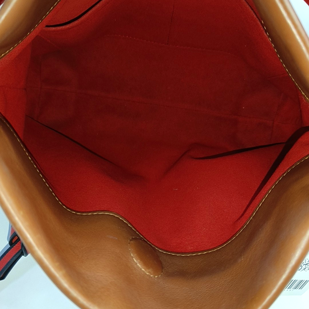 TUILERIES Monogram Coated Canvas Brown