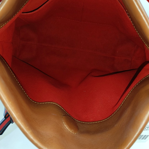 TUILERIES Monogram Coated Canvas Brown