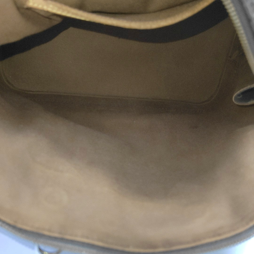 ALMA PM Monogram Coated Canvas Brown