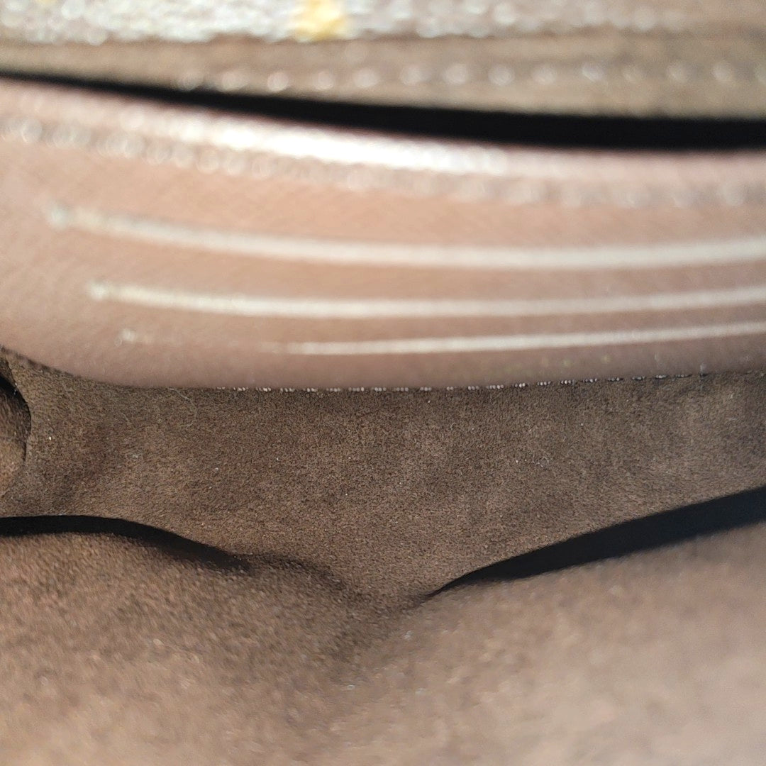 MADELEINE Monogram Coated Canvas Brown