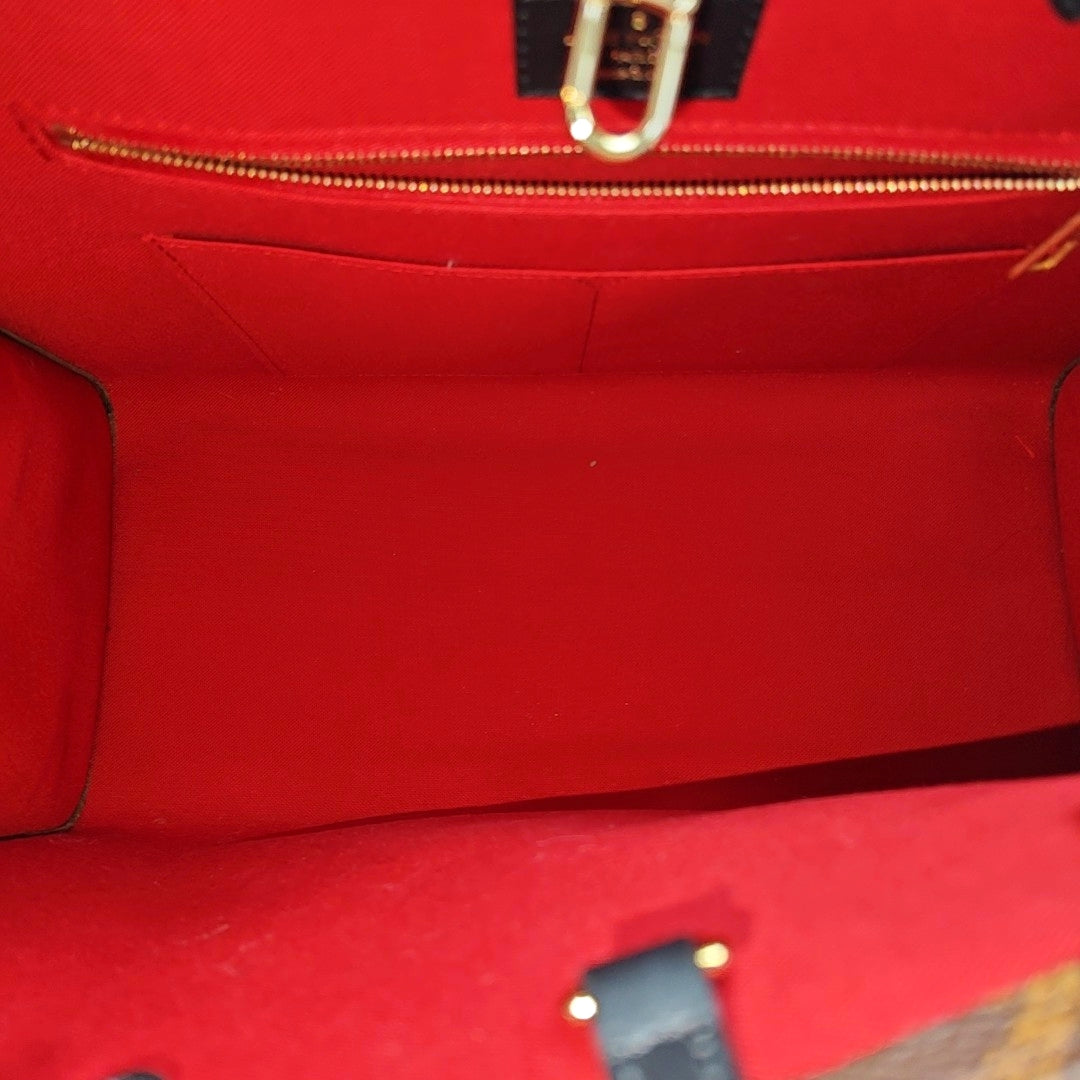 ONTHEGO MM Monogram Coated Canvas Brown
