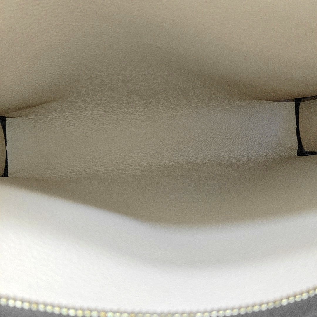 TOILET POCKET 26 Monogram Coated Canvas Brown