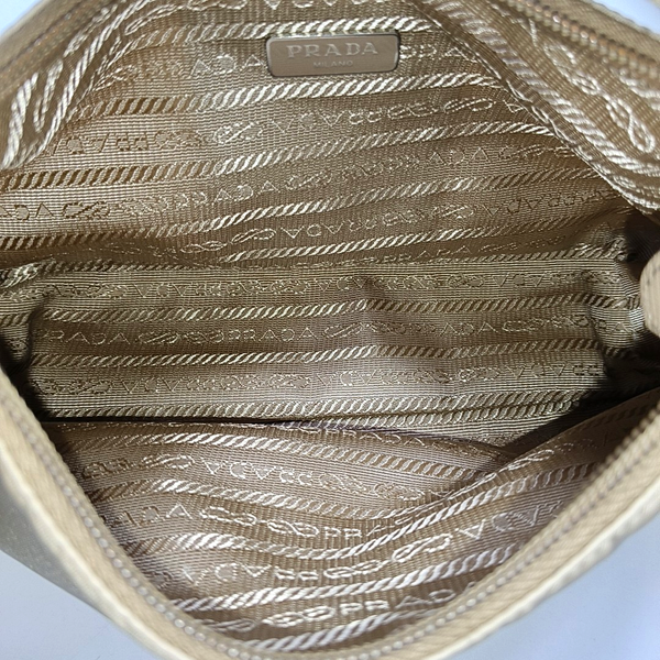 Authenticated pre-owned  Re-Edition2000 Mini Nylon Beige - Top Handle Bag at Looply