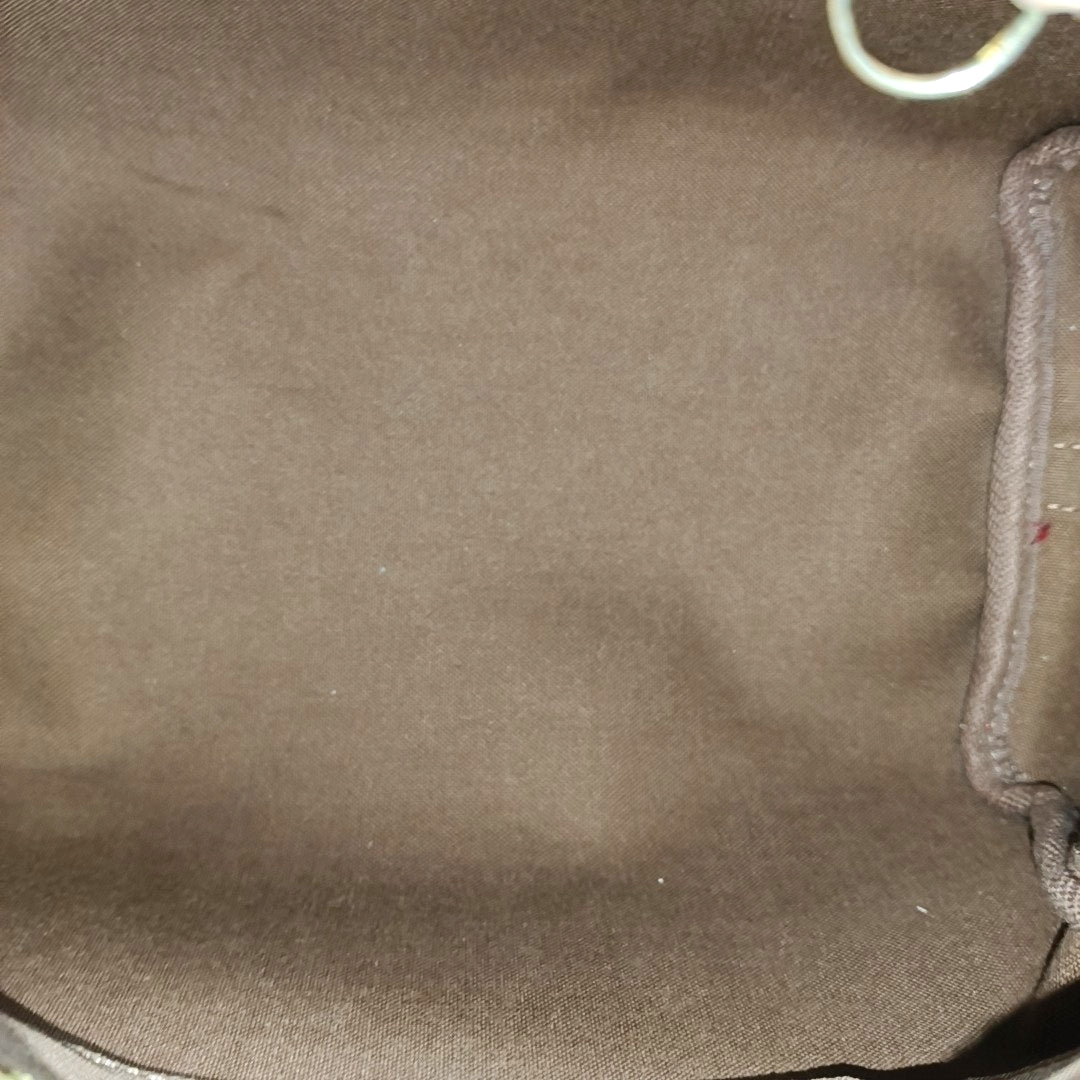 SPEEDY 25 Monogram Coated Canvas Brown