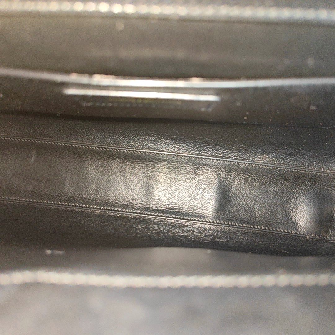 Authenticated pre-owned  MANHATTAN Calfskin Black - Top Handle Bag at Looply