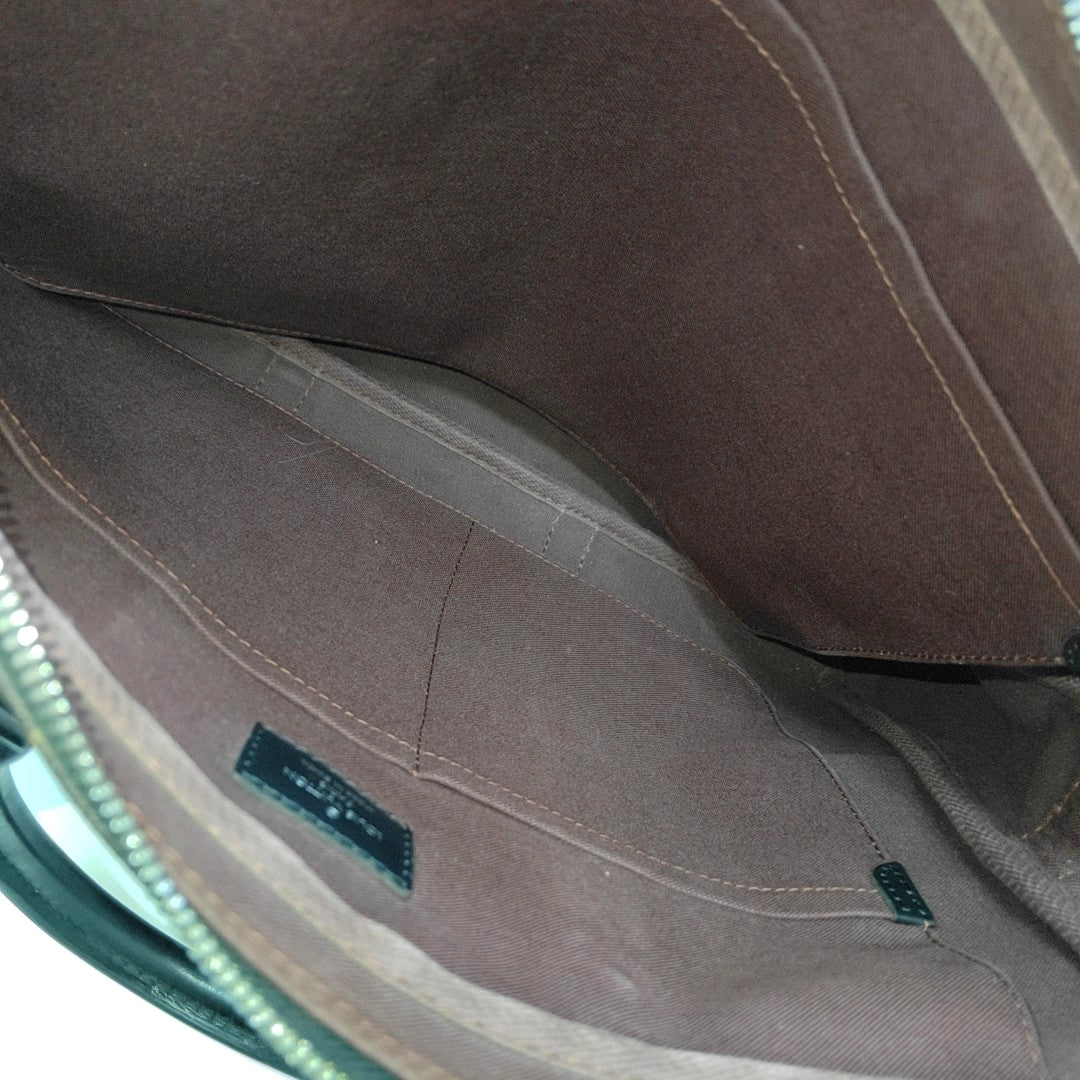 PORTE-DOCUMENTS PM Monogram Coated Canvas Brown