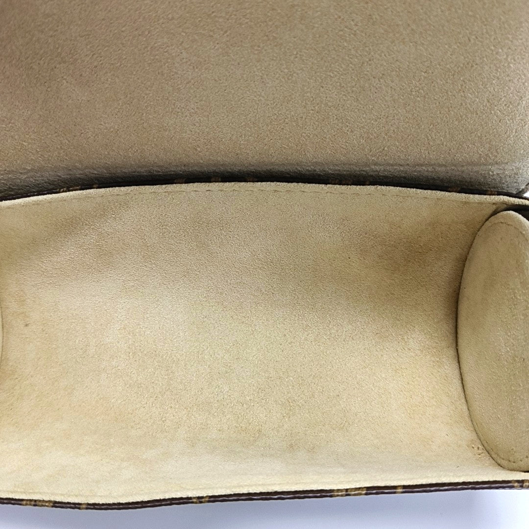 Monogram Coated Canvas Clutch Brown