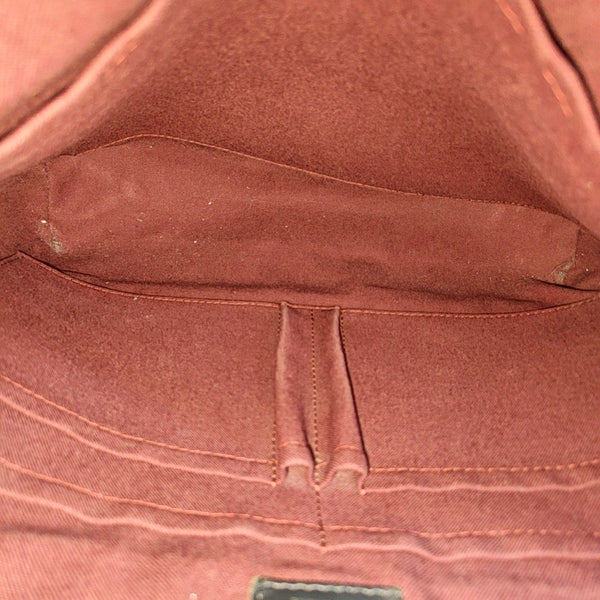 DISTRICT MM Monogram Coated Canvas Brown