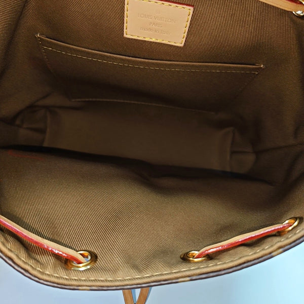 EXCURSION PM Monogram Coated Canvas Brown