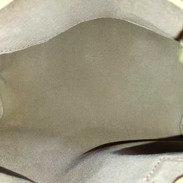 SPEEDY 25 Monogram Coated Canvas Brown