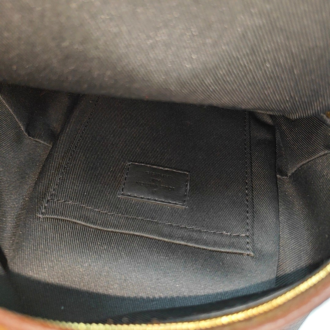 Authenticated pre-owned  PALM SPRINGS Mini Monogram Coated Canvas Brown - Backpack at Looply