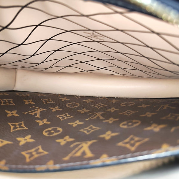 TRUNK Monogram Coated Canvas Brown
