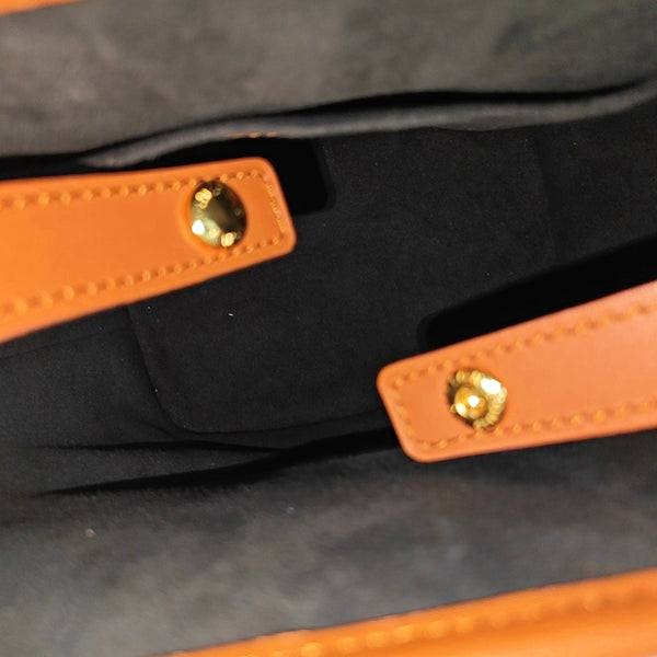 Monogram Coated Canvas PM Brown