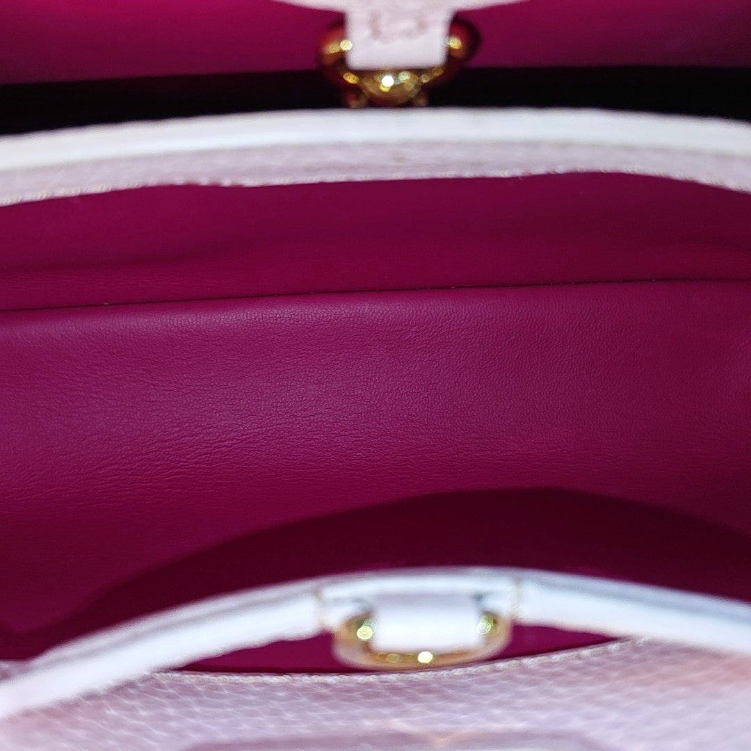 Authenticated pre-owned  CAPUCINES PM Calfskin Pink - Shoulder Bag at Looply