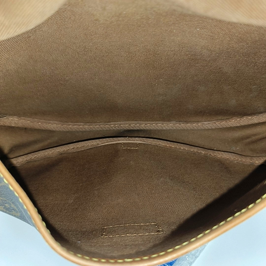 SAUMUR 30 Monogram Coated Canvas Brown