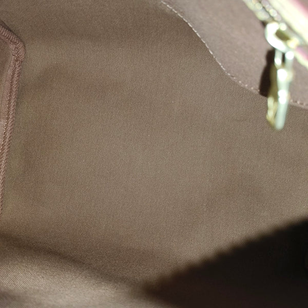 SPEEDY 25 Monogram Coated Canvas Brown
