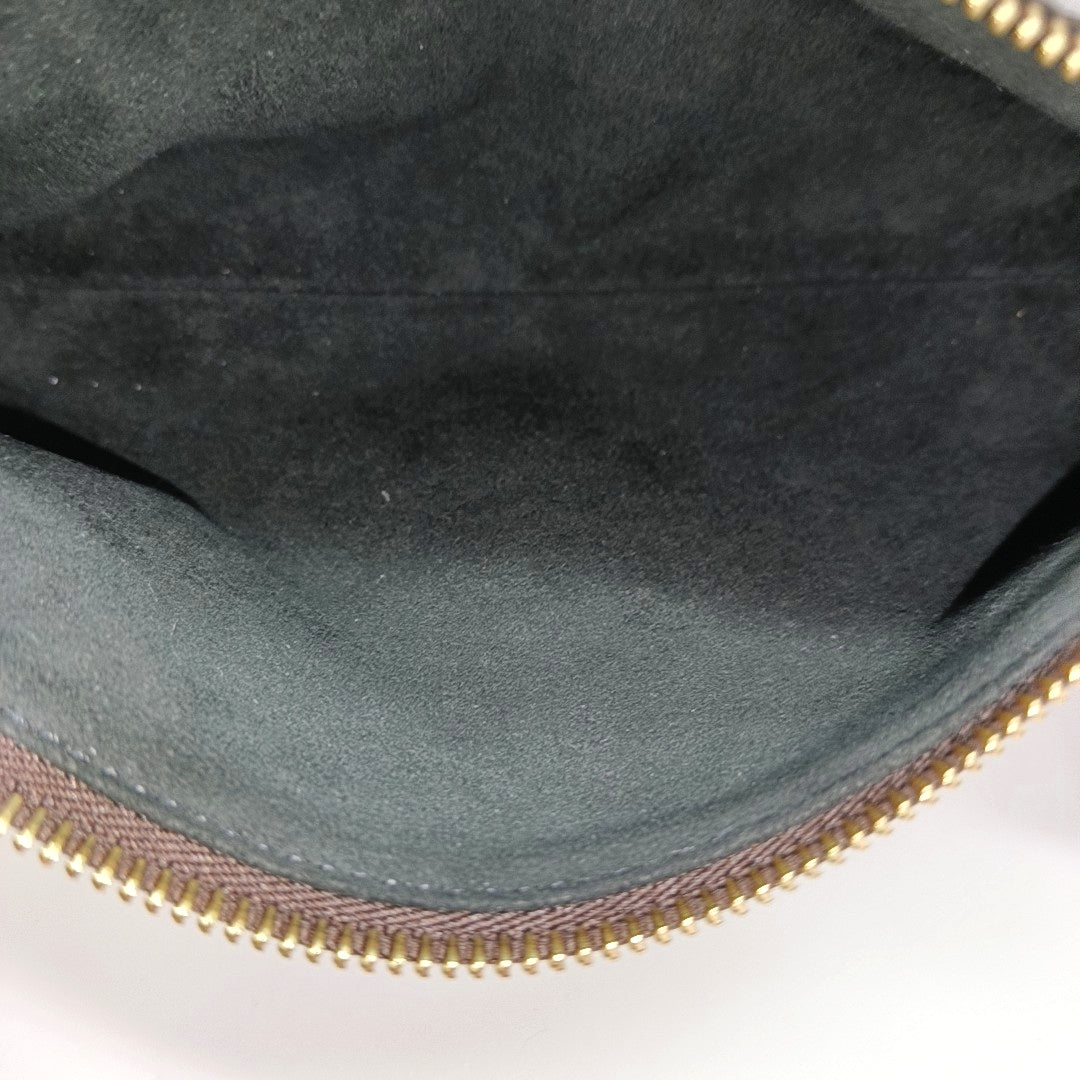 SLIM TRUNK Monogram Coated Canvas Brown