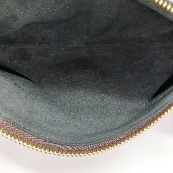 SLIM TRUNK Monogram Coated Canvas Brown