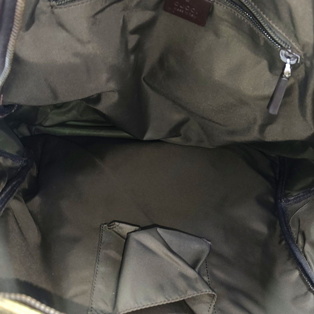 Monogram Coated Canvas Backpack Brown