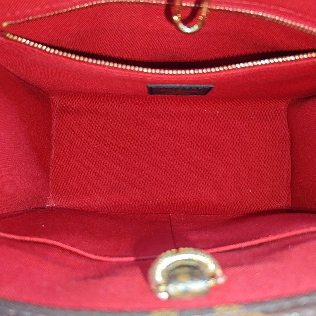 ONTHEGO PM Monogram Coated Canvas Brown