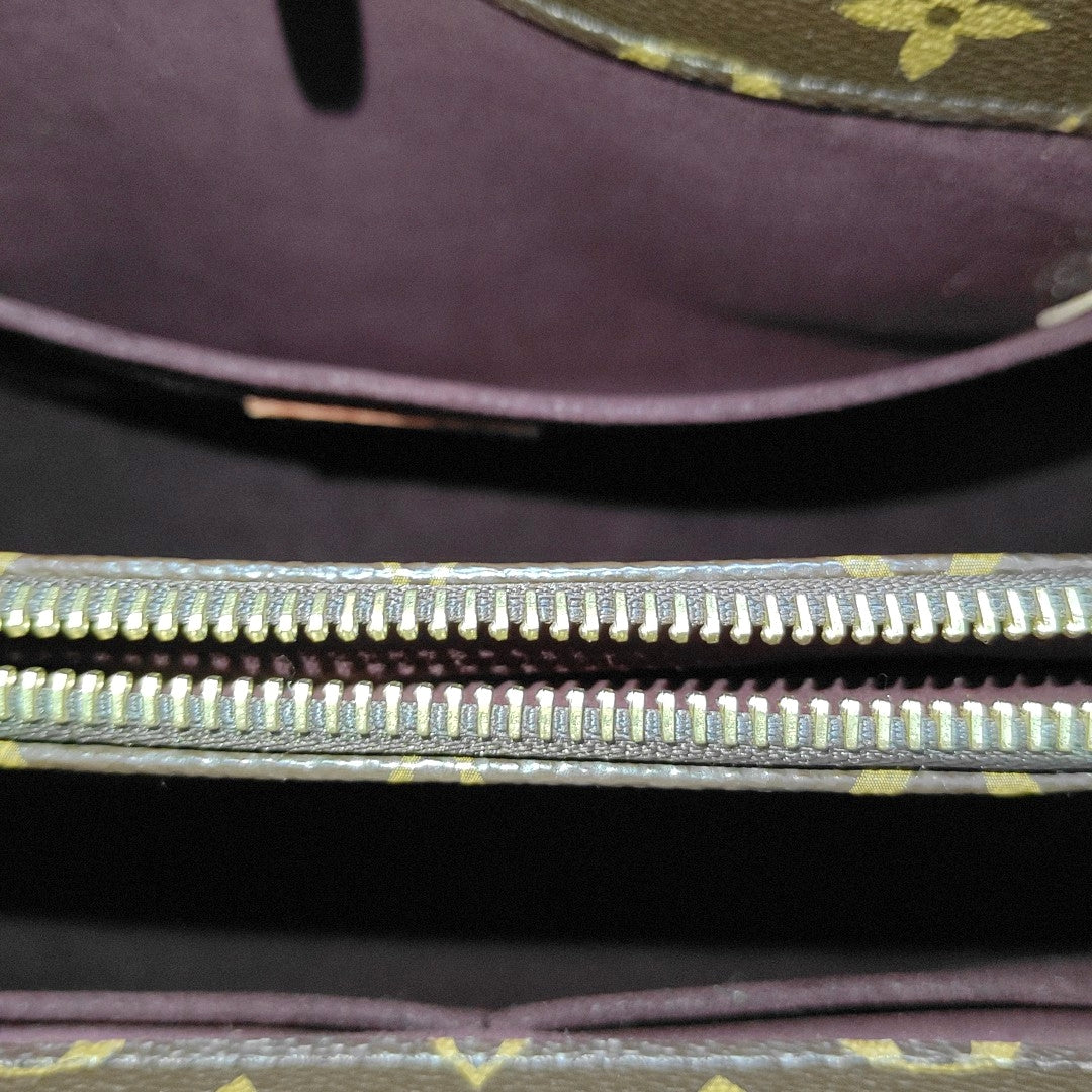 MONTAIGNE GM Monogram Coated Canvas Brown