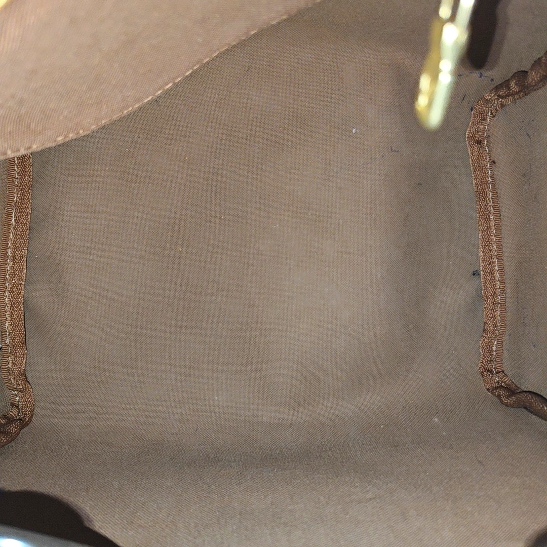 SPEEDY 25 Monogram Coated Canvas Brown